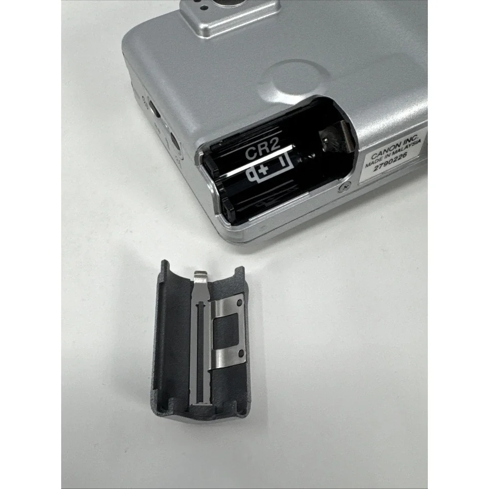 CANON Elph Jr. APS Film Camera, 26mm‎ f2.8 Wide Angle Lens, Silver w/ Case WORKS